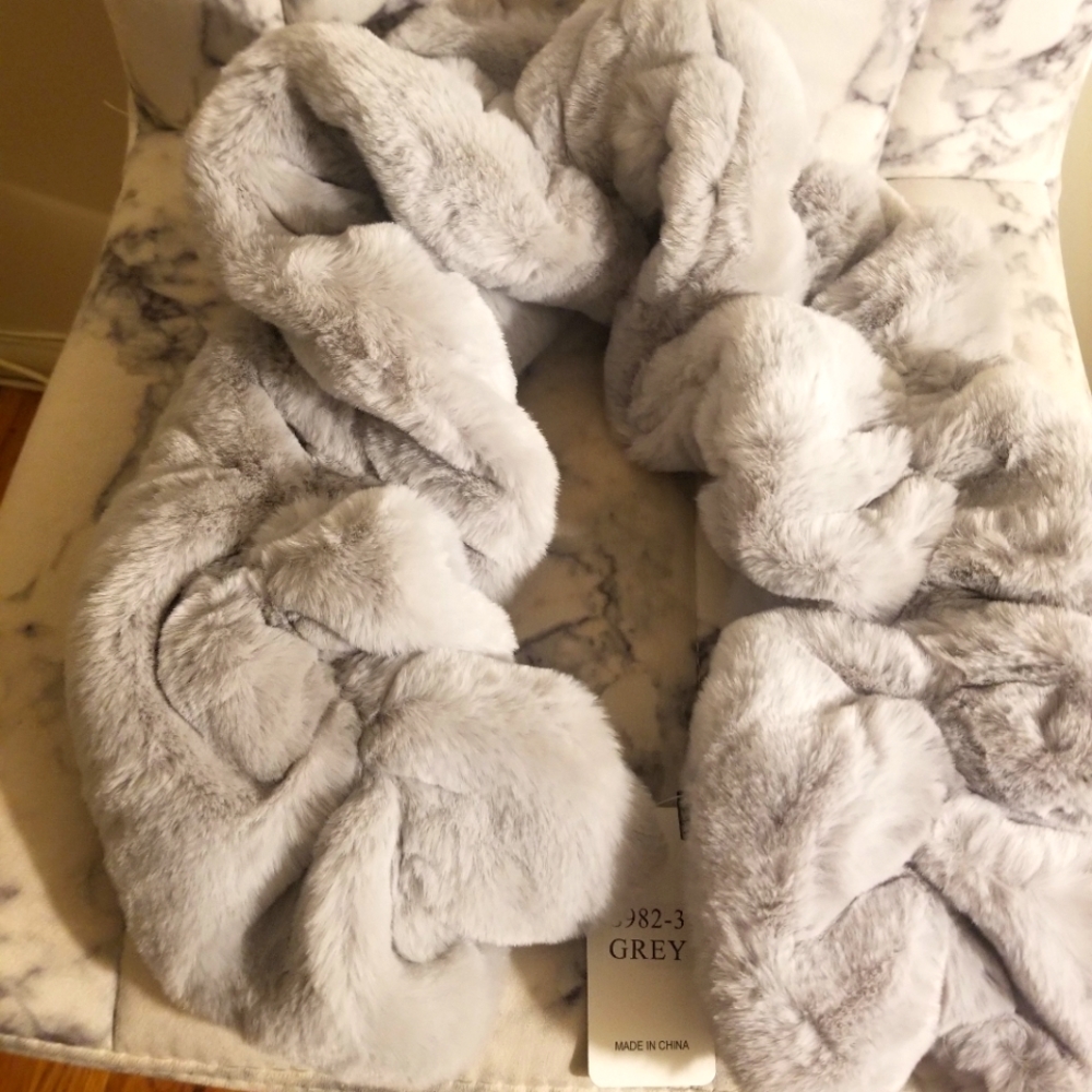 Brand new faux fur scarf.  Grey